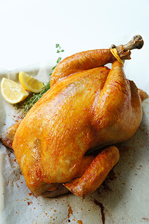 Roasted chicken with fresh aromatic herbs and paprika